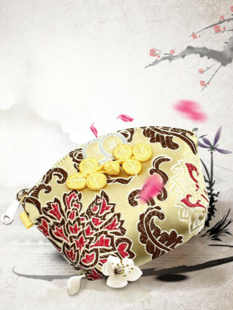 Silken Touch palm-sized Nanjing brocade wallet with traditional floral design in red and gold, showcasing artistic elegance and luxury