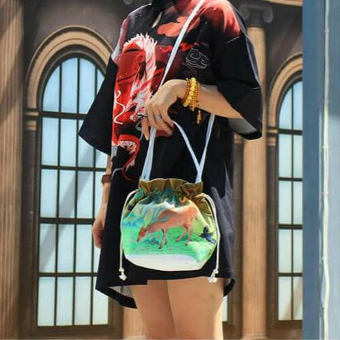 독특한 문화적 디자인을 지닌 가벼운 캔버스 드로스트링 토트백