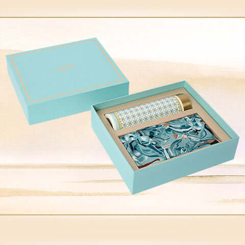 Luxurious silk scarf and thermos set with exquisite peony design in elegant gift box.