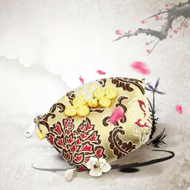 Silken Touch palm-sized Nanjing brocade wallet with traditional floral design in red and gold, showcasing artistic elegance and luxury