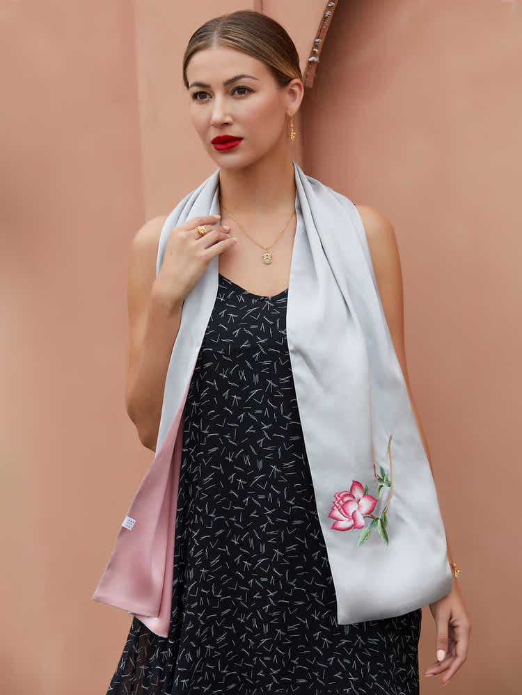 Grey-pink Suzhou silk scarf with vibrant orange blossom embroidery, perfect for adding luxury and cultural heritage to any wardrobe.