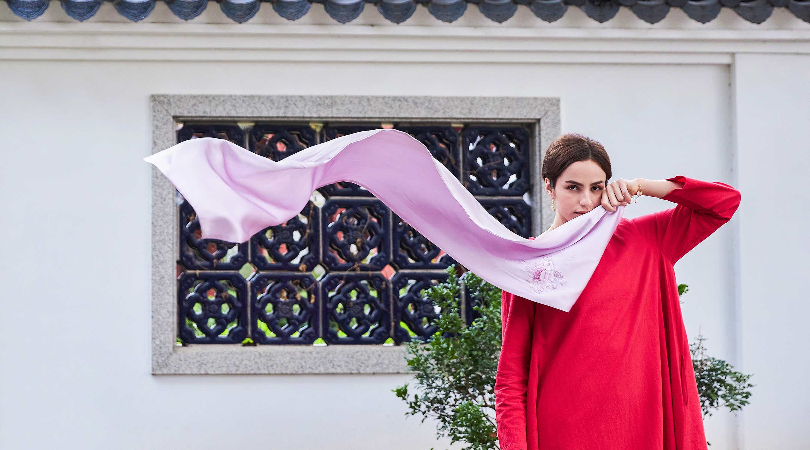 Pink peony Su Xiu silk scarf on a mannequin, showcasing the intricate artistry and timeless design of Chinese embroidery.