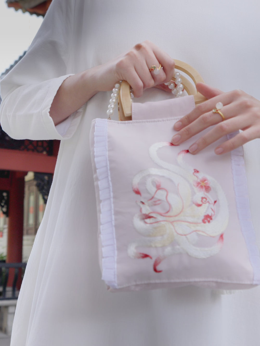 Exquisite Chinese Handcrafted Crossbody Bag with Silk Embroidery, Wooden Handle with Pearl Chain, Pink Color Canvas Fabric With Nine-Tailed Fox Pattern