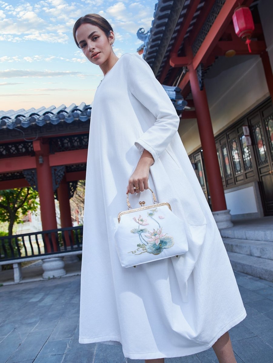 White Silk Clutch: Lotus Embroidery Art, Breathable & Pristine Luxury - Yomkey