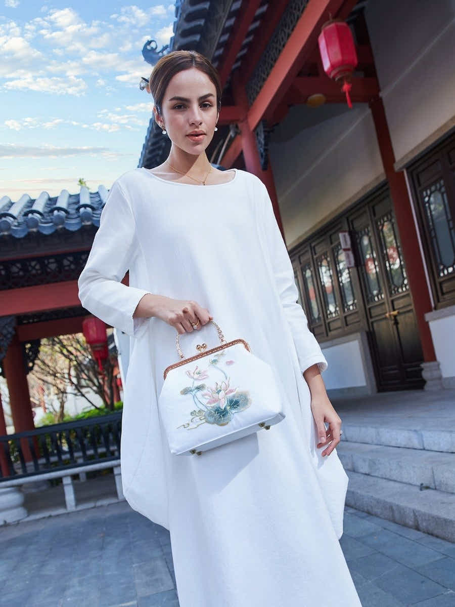 White Silk Clutch: Lotus Embroidery Art, Breathable & Pristine Luxury - Yomkey