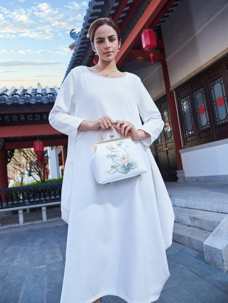 White Silk Clutch: Lotus Embroidery Art, Breathable & Pristine Luxury - Yomkey