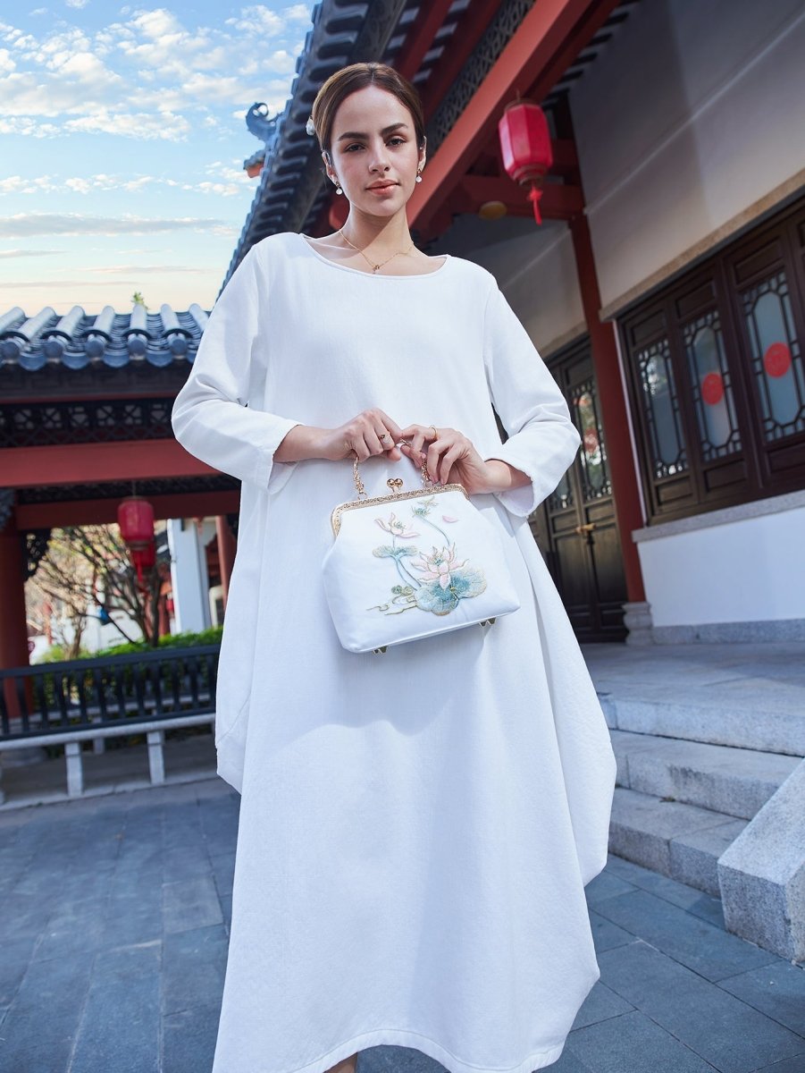 White Silk Clutch: Lotus Embroidery Art, Breathable & Pristine Luxury - Yomkey