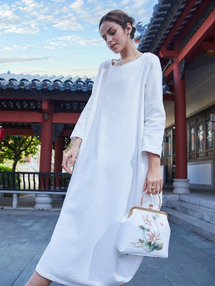 White Silk Clutch: Lotus Embroidery Art, Breathable & Pristine Luxury - Yomkey