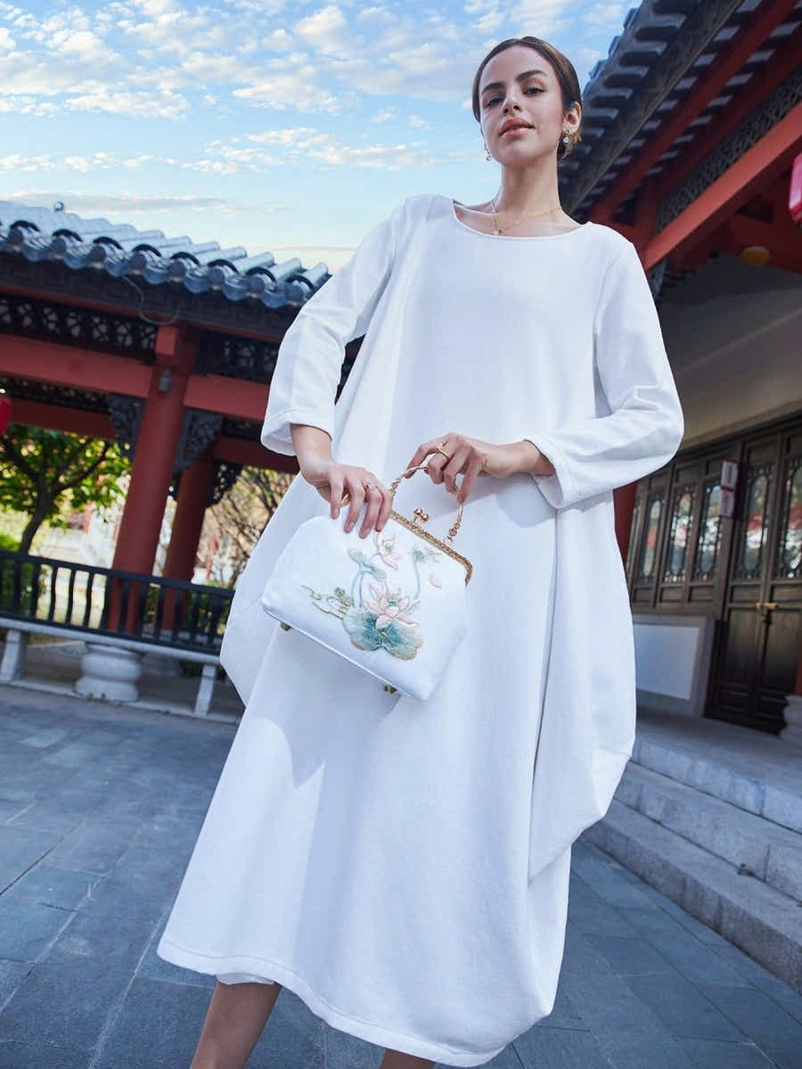 White Silk Clutch: Lotus Embroidery Art, Breathable & Pristine Luxury - Yomkey