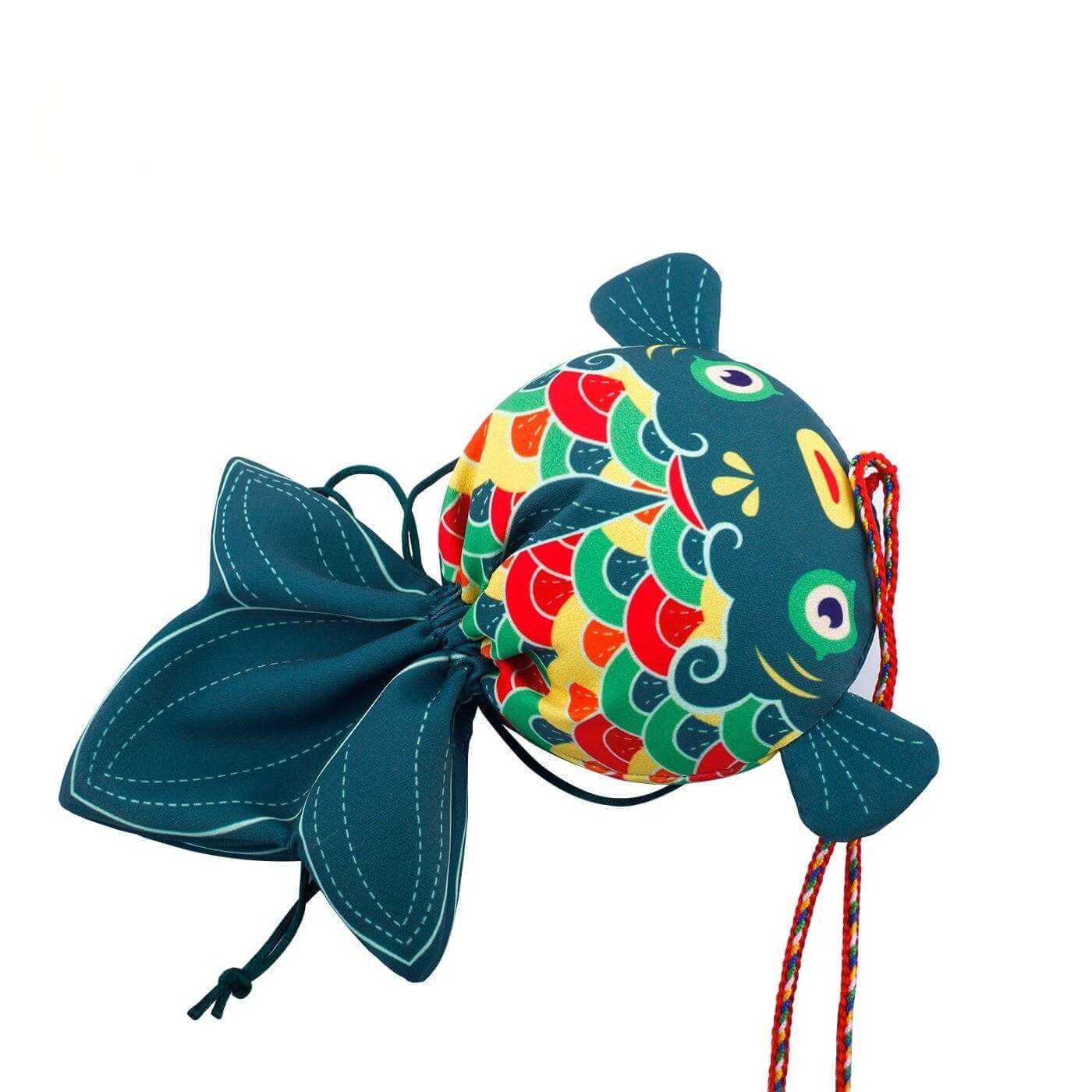 Handcrafted Koi Fish Sachet with colorful scales and blue fins, symbolizing prosperity, offering health benefits through medicinal herbs