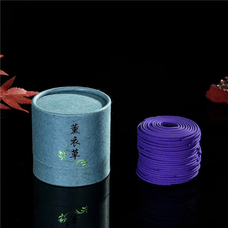 Exquisite Chinese incense collection with luxurious fragrances in a decorative container and purple incense coils.